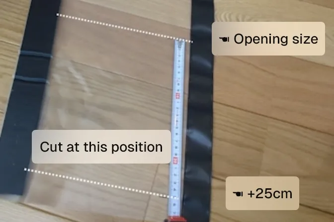 A tape measure on the sheet showing the opening size plus 25 cm and the cutting position